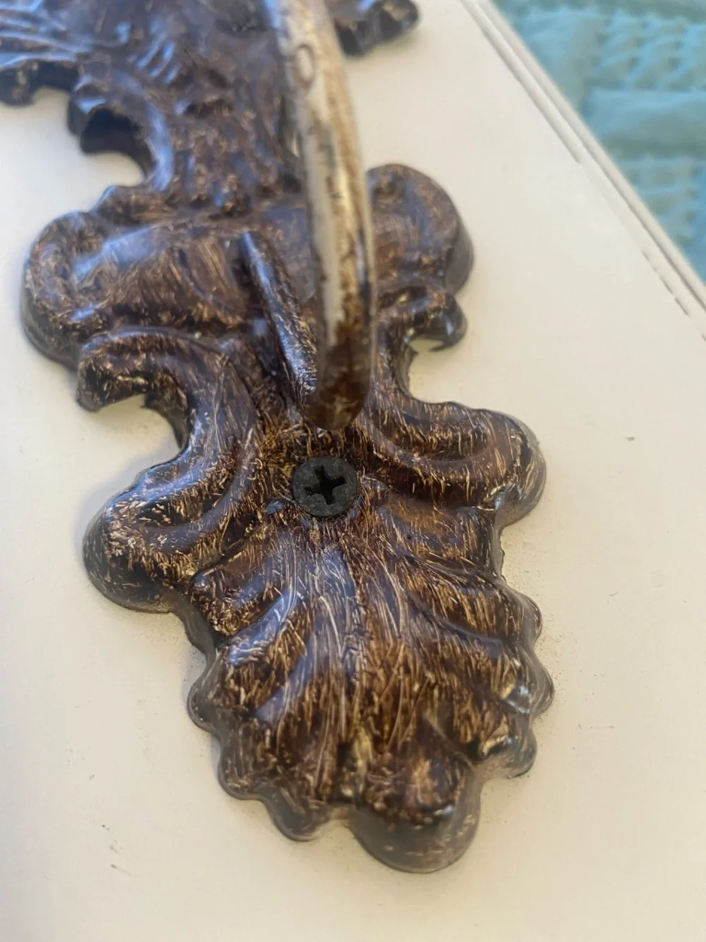 Decorative Cream Wall Hook with Vintage Bronze Colored Accent and Acrylic Knob